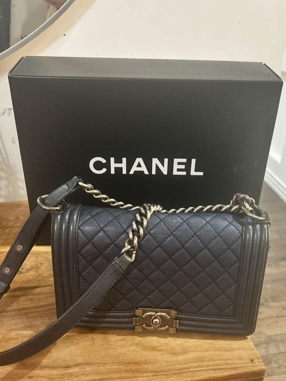 CHANEL navy Quilted Boy medium with silver Hardware. Authentic
